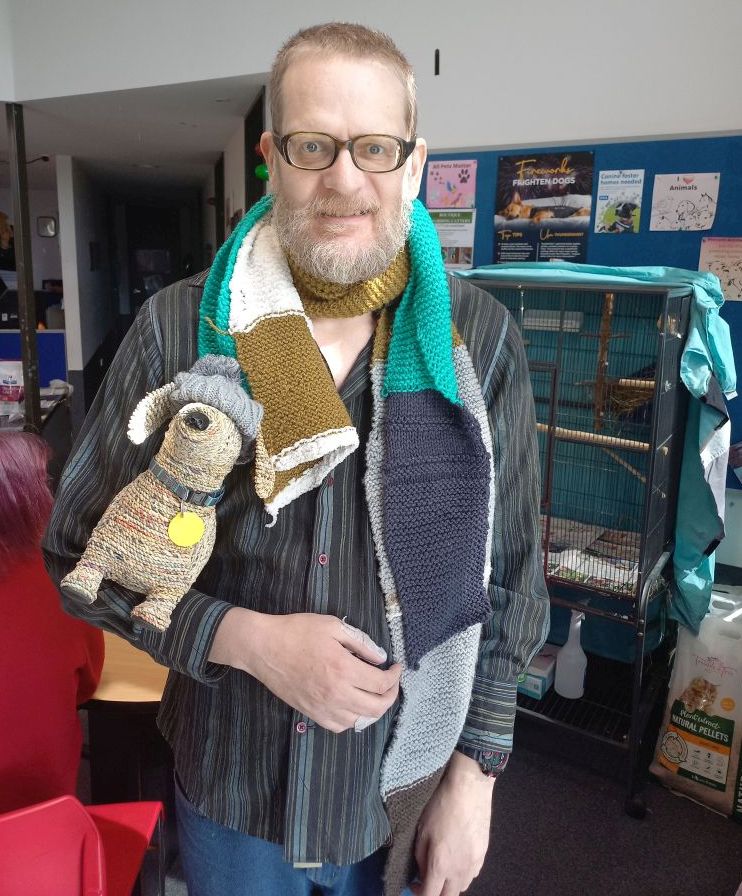 We came to the SPCA to drop off some scarves for the cats at the SPCA.  Me with some scarves that I have knitted.